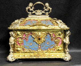 An exceptional quality French 19th century ormolu and silvered bronze jewel casket having finest Sevres panels. Height 36cm, Width 37cm