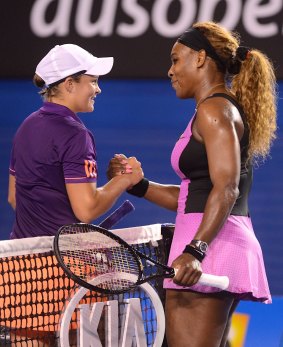 Serena Williams and Ashleigh Barty after their match on Rod Laver Arena in 2014.