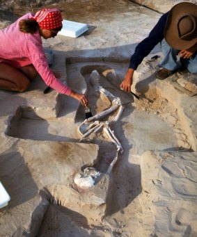 Dr. Wilfred Shawcross, right, and the late Anthea Carstairs, left, excavate the remains of "Mungo Man" in 1974. 