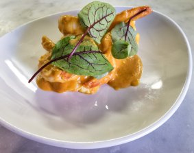 The tiger prawns, romesco and kipfler potato dish at Bellota.