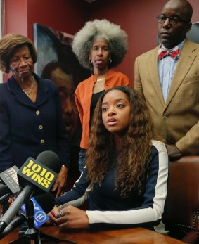 NAACP New York State Conference president Hazel Dukes, far left, stands near her god-daughter civil rights activist Tamika Mallory, seated, in New York. 