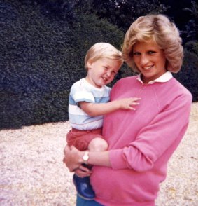 Princess Diana holding Prince William while pregnant with Harry, in a previously unseen photo which  features in the new documentary.