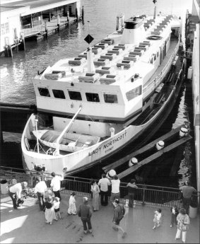 The Lady Northcott ferry. resting against the Circular Quay concourse, after breaking through the wooden buffers in August 1980.