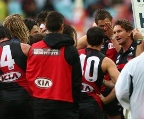 James Hird addresses the players in round one of this year.