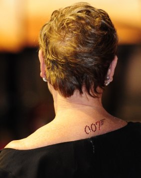 British actor Judi Dench with a (temporary) 007 tattoo at the premiere of the James Bond film Quantum of Solace in 2008.