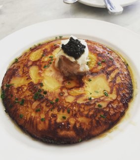 The smoked fish and caviar-topped Johnnycake at Neptune Oyster.