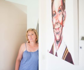 Rosie Batty earlier this month with a portrait of her beloved 11-year-old son Luke. She says his father, who killed him, loved him as much. 