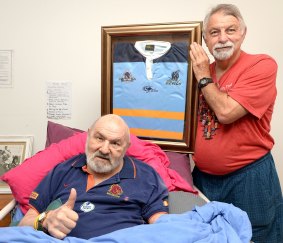 "His eyes were still rolling around his head. Mum and Dad thought he was dead": League legend Fonda Metassa poses for a photo with his brother John.