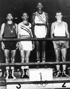 Olympic glory: Cassius Clay on top of the podium at the Rome Olympics. Tony Madigan (second from left) won bronze.