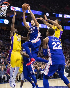 Taking flight: Ben Simmons drives to the basket.