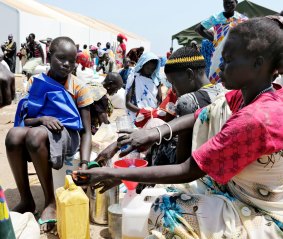 Internally displaced South Sudanese at a United Nations food distribution centre in Mingkaman. The centre provides food for more than 90,000 people who fled fighting in the nearby city of Bor.