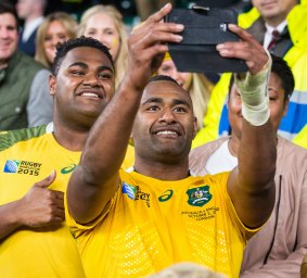 In the picture: Tevita Kuridrani takes for a selfie with a lucky fan after the win against England.