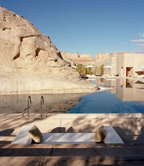 The swimming pool at Amangiri resort in Canyon Point, Southern Utah curves around rocks.