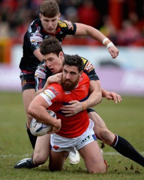 Well travelled: Dragons recruit Tyrone McCarthy plays for Hull Kingston Rovers against Wigan Warriors in the Super League last season.