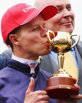 To the victor: Melbourne Cup winning jockey Kerrin McEvoy enjoys his success.