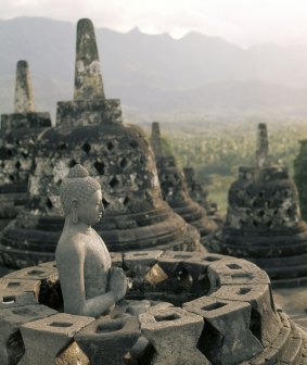 The circular terraces, Borobudur. Each stupa houses a figure of the Dhyani-Buddha Vajrasattva in Central Java.