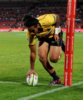Try time:  Joe Tomane crosses for the Brumbies.