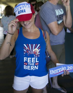 Hawaii voter Noelle Giambalvo shows off her Bernie Sanders' swag while waiting in line at the Hawaii caucus at Kailua Intermediary School.