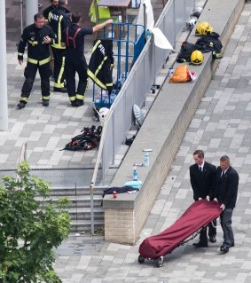 Bodies are removed from Grenfell Tower after the building was engulfed in flames. 