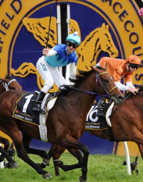 The one to beat: Zac Purton rides Admire Rakti to victory in the Caulfield Cup.