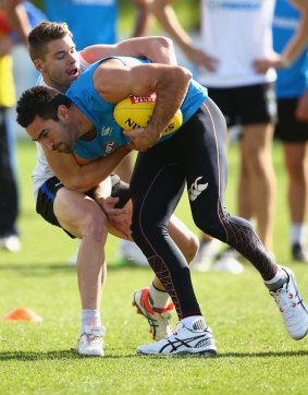 Still confident: Michael Firrito and Max Warren at Kangaroos training on Wednesday.