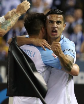 City's Tim Cahill celebrates after scoring in round two against Victory.