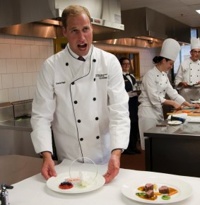 Are there any oysters in this? Prince William tries his hand at cooking during a Royal tour of Canada in 2011.