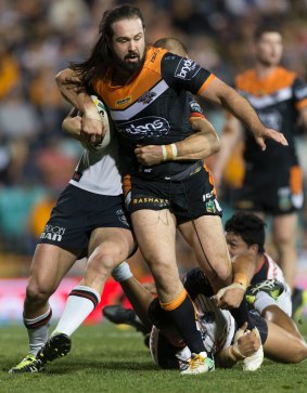 Aaron Woods of the Tigers has been named captain of a Prime Minister's XIII.