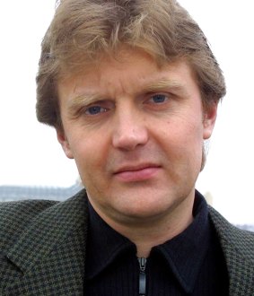 Alexander Litvinenko, former KGB spy and author of the book <i>Blowing Up Russia: Terror From Within</i>, at home in London in 2002. 