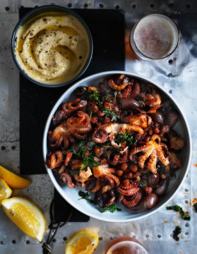 Baby octopus with hummus, fried chickpeas and olives.
