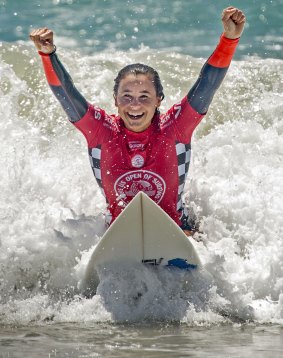French surfer Johanne Defay celebrates her victory at the US Open of Surfing.