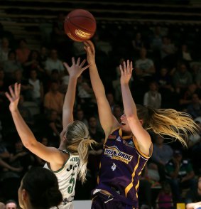 Rebecca Cole (right) posted a career-high 25 points.
