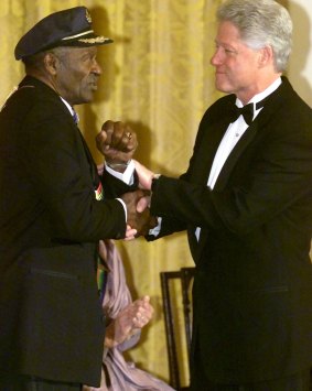 U.S. President Bill Clinton shakes hands with Chuck Berry during a ceremony at the White House in Washington, 2000. 