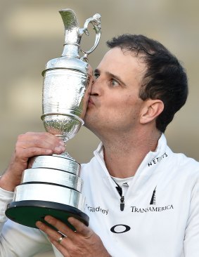 Zach Johnson kisses the Claret Jug after winning the 144th Open Championship at The Old Course.