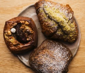 The banana pecan croissant (left), the pistachio blackberry croissant and the dark chocolate croissant at Rollers.