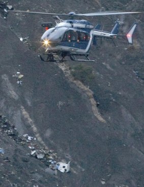Debris of the Germanwings passenger jet is scattered on the mountain side near Seyne les Alpes.