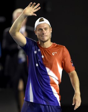 Over, and out: Lleyton Hewitt waves to the crowd after his second round loss to David Ferrer.