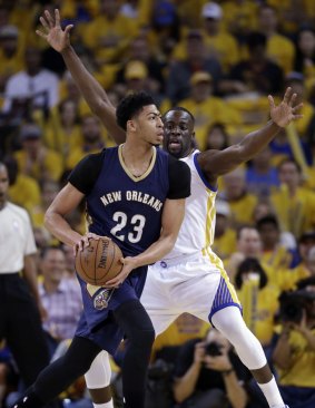 Heavily guarded: Golden State Warriors forward Draymond Green defends New Orleans star Anthony Davis.
