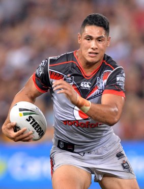 Improved effort: Roger Tuivasa-Sheck hits the line for the Warriors during their loss to Brisbane.