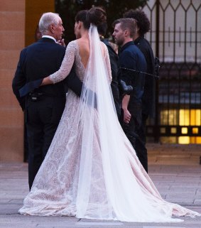 Neville Crichton with his bride Nadi Hasandedic at Sydney University on Saturday.