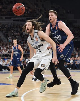 Boxing clever: United's Trait Miller holds out 36ers' Matt Hodgson at Hisense Arena.