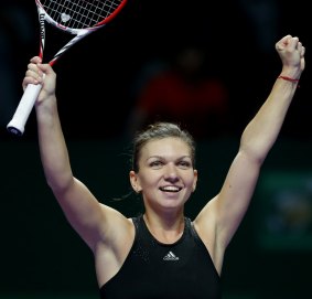 Simona Halep celebrates after defeating Serena Williams.