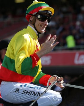 Blake Shinn returns to scale after his fourth win of Cox Pllate day.