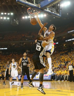 The air up there: Andrew Bogut dunks on Boris Diaw.