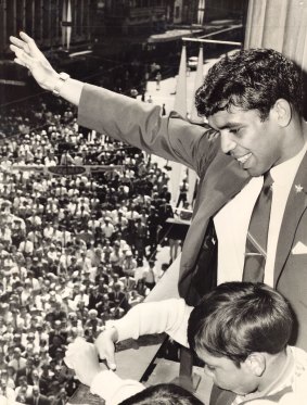 Lionel Rose on the Melbourne Town Hall balcony with members of his family for the home-coming parade.