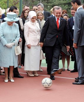 Former Turkey football star Hakan Sukur (right) is pictured here with Queen Elizabeth II and Turkish leader Tayyip Erdogan in 2008.