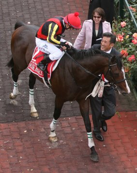 Ready for another tilt at the Melbourne Cup: Katsumi Yoshida leads Delta Blues to the winners enclosure in 2006.