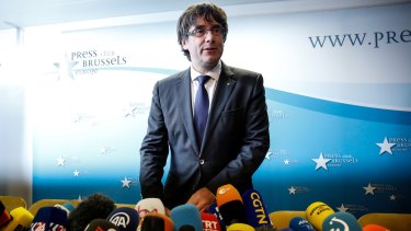 Carles Puigdemont, Catalonia's ousted president, arrives for a news conference at the Press Club in Brussels.