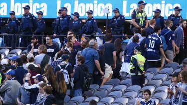 Melbourne Victory fans stage a walkout during the round eight match against Adelaide United at Etihad Stadium on November 28.