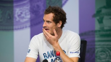Britain's Andy Murray at a press conference after losing his Men's Singles Quarterfinal Match against Sam Querrey of the United States on day nine at the Wimbledon Tennis Championships in London, Wednesday, July 12, 2017. 